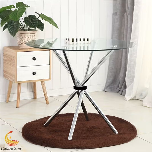 A Sleek And Contemporary Chrome Metal Cross-Support Round Glass Coffee Table